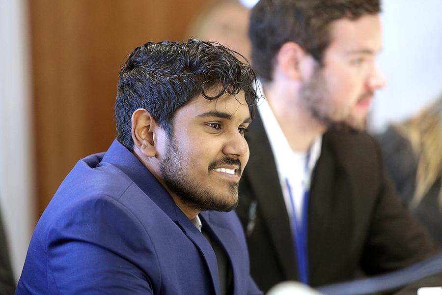 Accounting major Joseph Barrett smiles as members of the 足彩平台 Institute of Management Accountants (IMA) organization listen to a panel discussion.